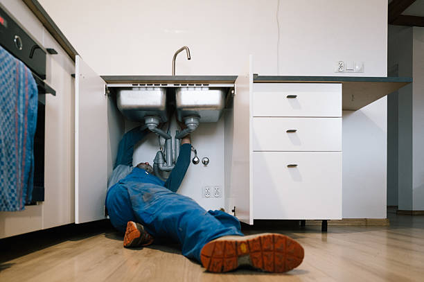 Professional Drain Cleaning technician working in Morganville, NJ